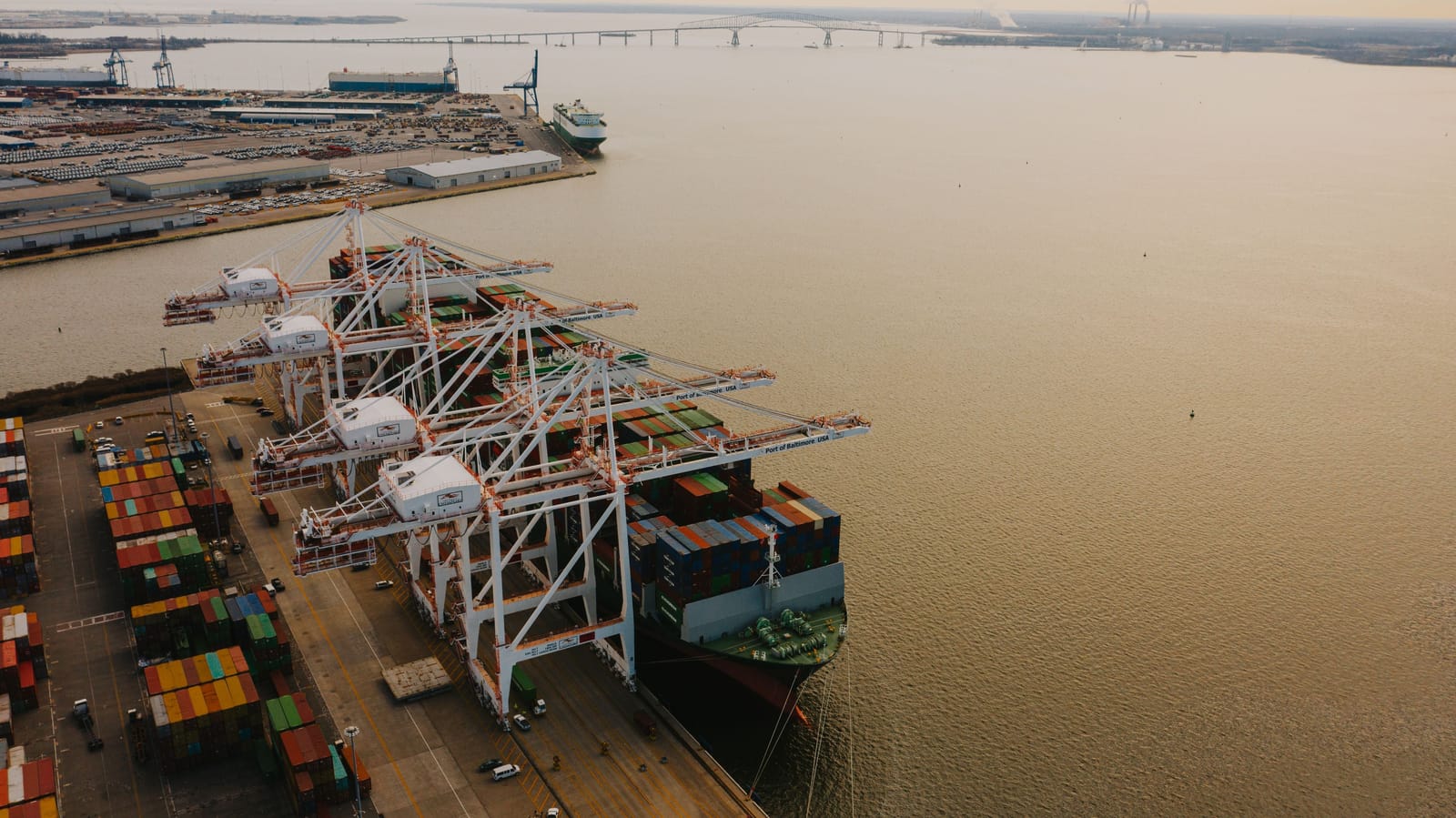 The Port of Baltimore from above, cranes working a container ship